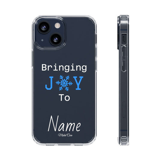 Personalized Christmas clear phone case with 'Bringing J❄️Y To Name' snowflake design on iPhone